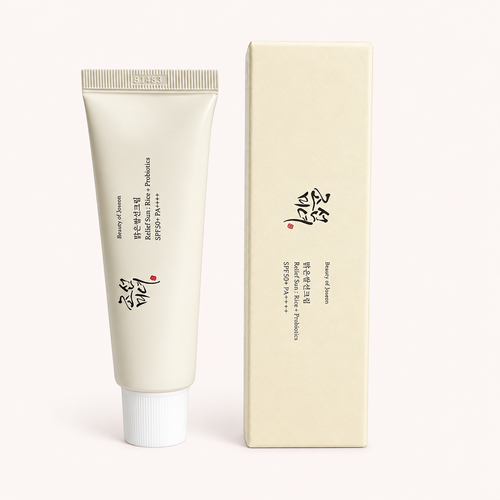 Tube et boîte du sérum solaire Beauty of Joseon sur fond rose très clair #fcf7f6